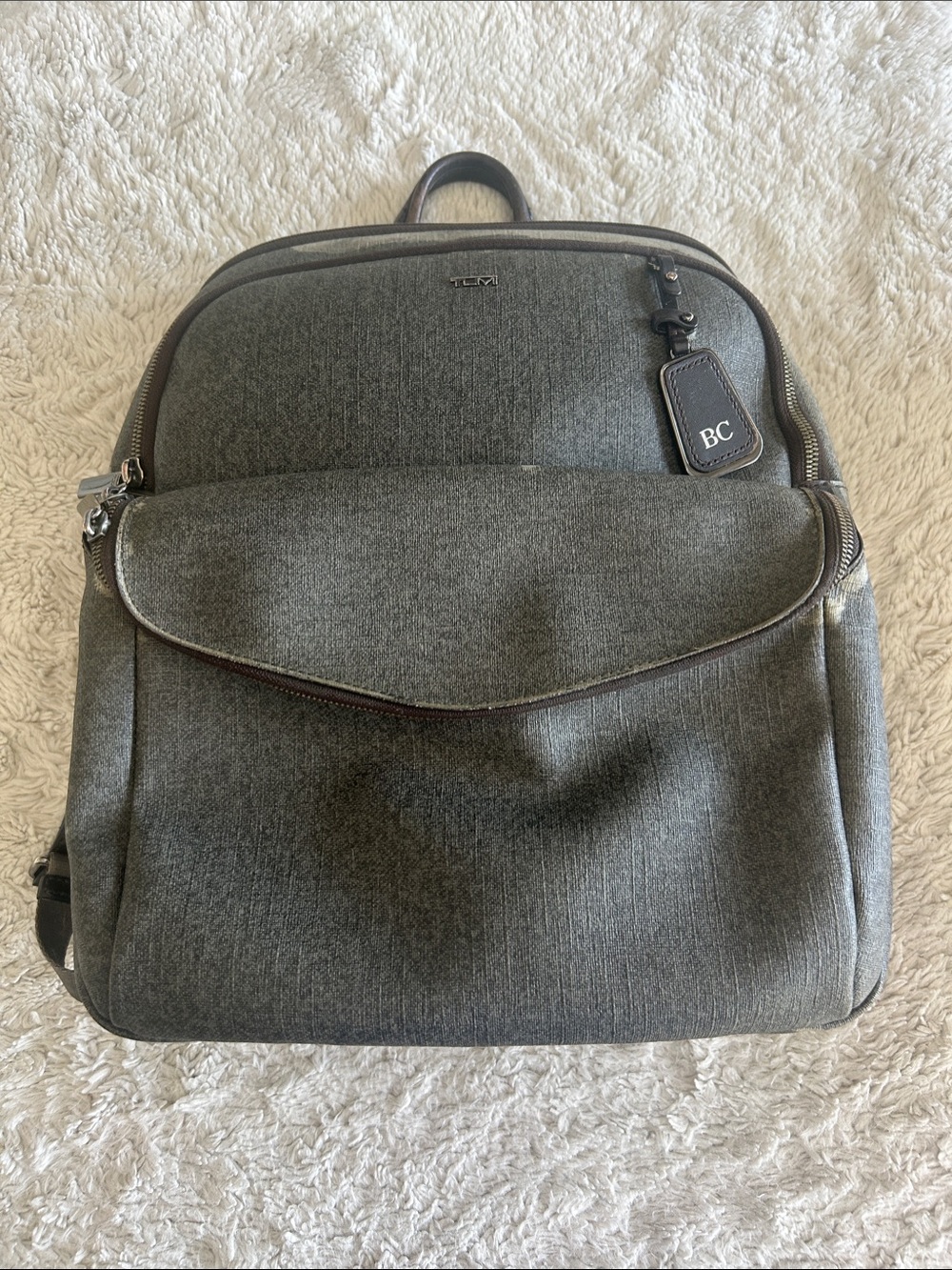 Tumi Gray Backpack with Leather Trim and Monogram Tag
